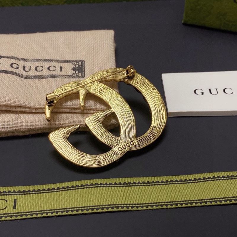 Gvc*1 brooches